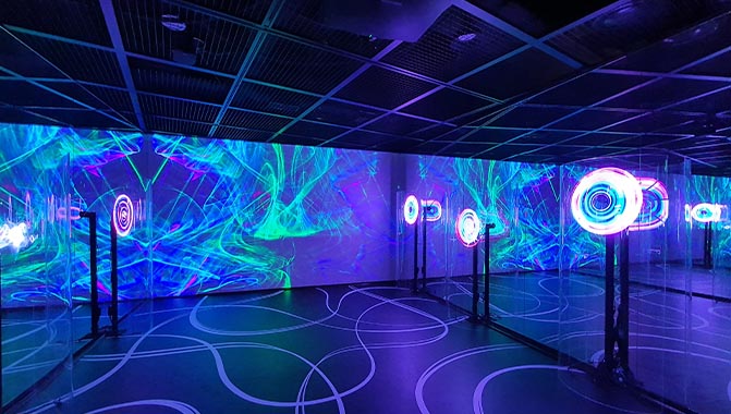 Christie 1DLP laser projectors illuminate Curious 12 Tales exhibition with enchanting visuals 