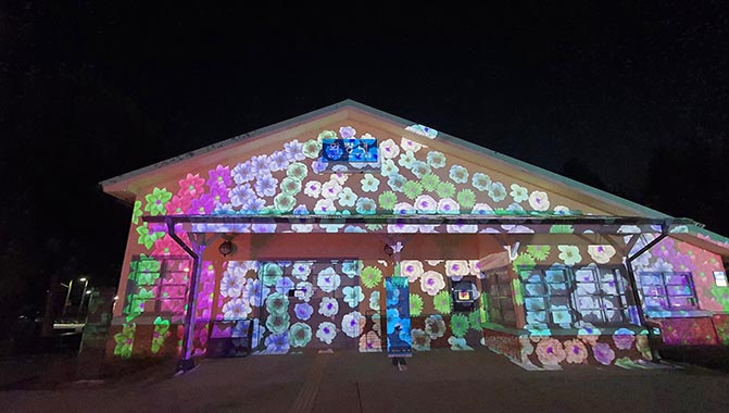 Colorful projections on the old Hwarangdae Station are achieved by a Christie D16WU-HS laser projector