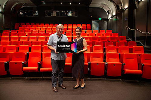 Andrew Markwell, head of fundraising and development at AFTRS and Olga Aleksan, senior regional sales manager for Australia and New Zealand, Cinema, Christie, with the plaque to be installed at the entrance of the Main Theatre