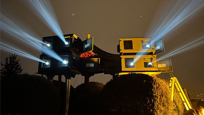 The DWU1100-GS laser projectors housed in specialized weatherproof enclosures.