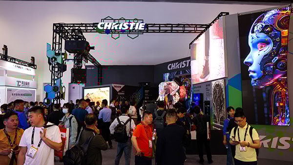 Attendees at the Christie booth at InfoComm China 2025